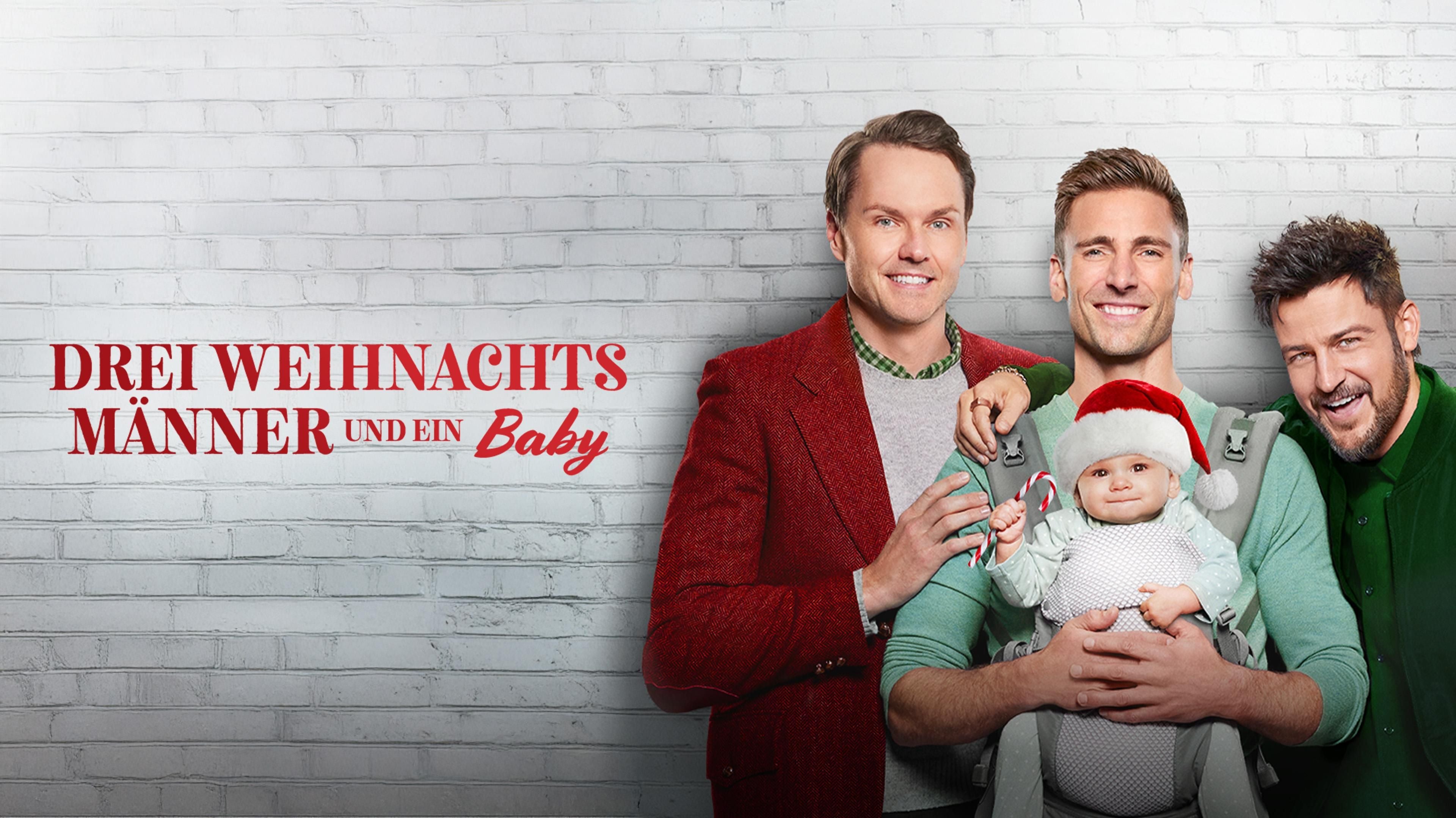 Drei Weihnachtsmänner und ein Baby