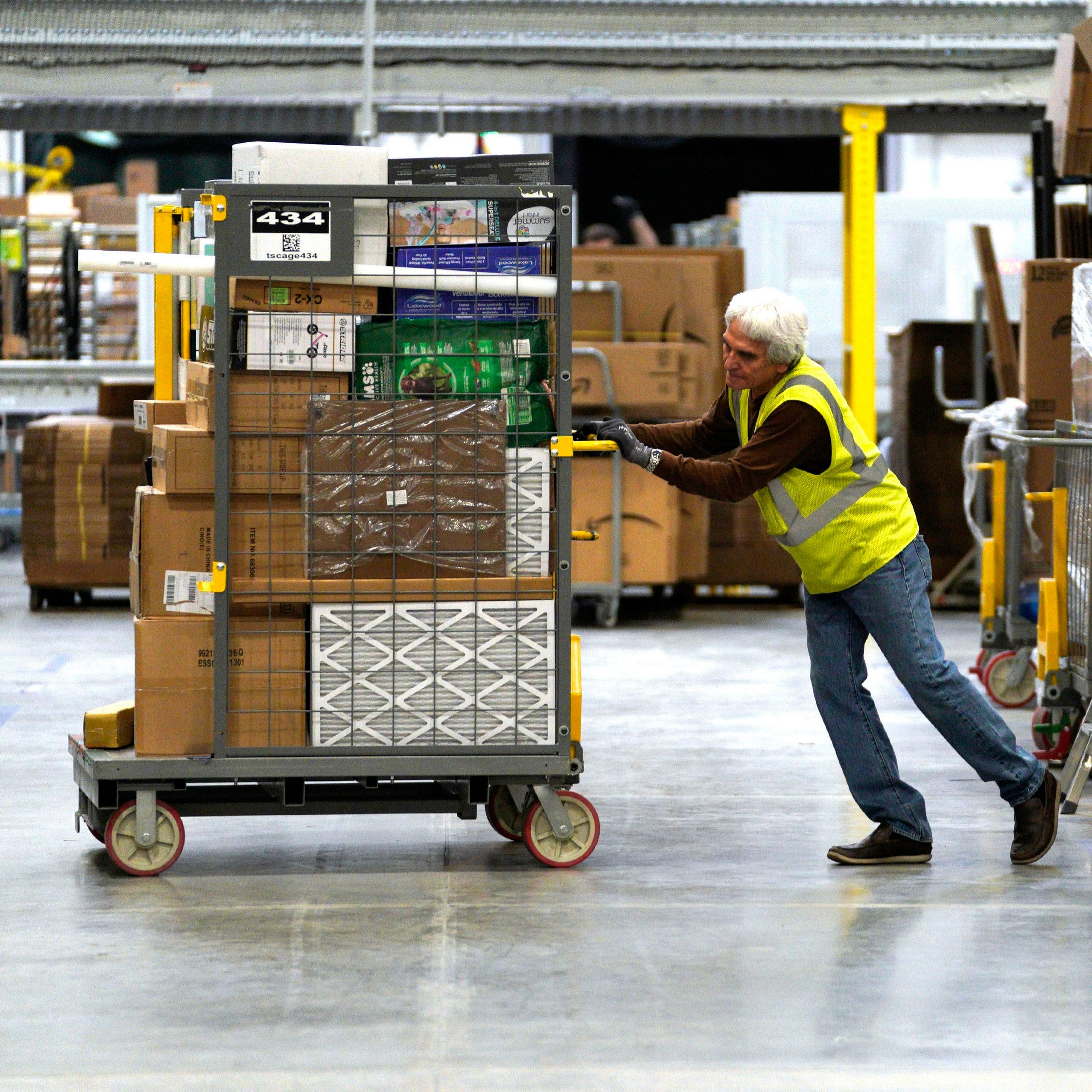 Amazon adds to pay boost to address backlash