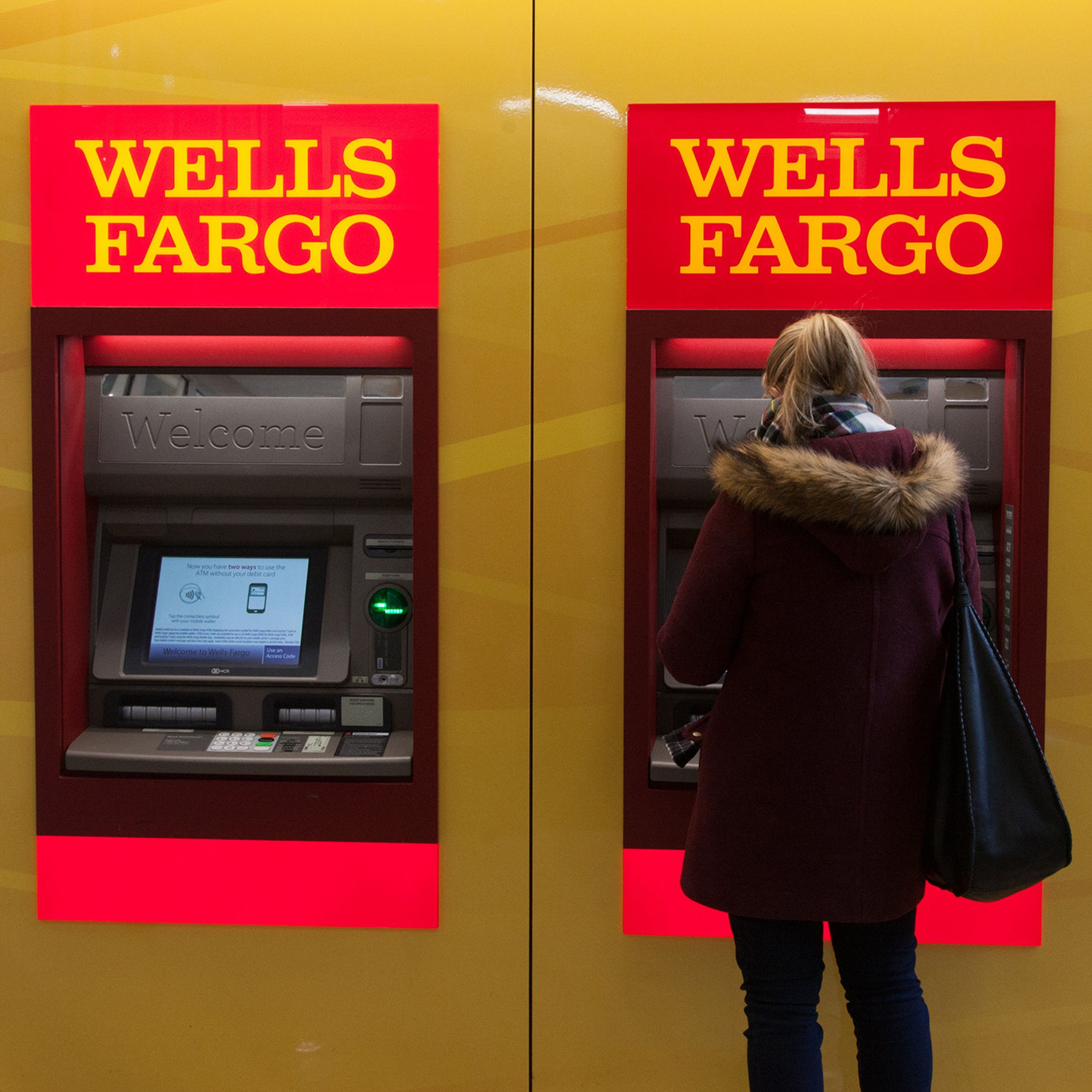 Fed sanctions Wells Fargo over 'customer abuses'