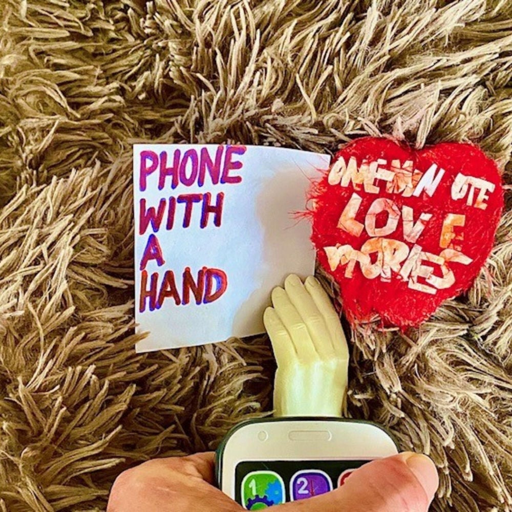 Phone With A Hand