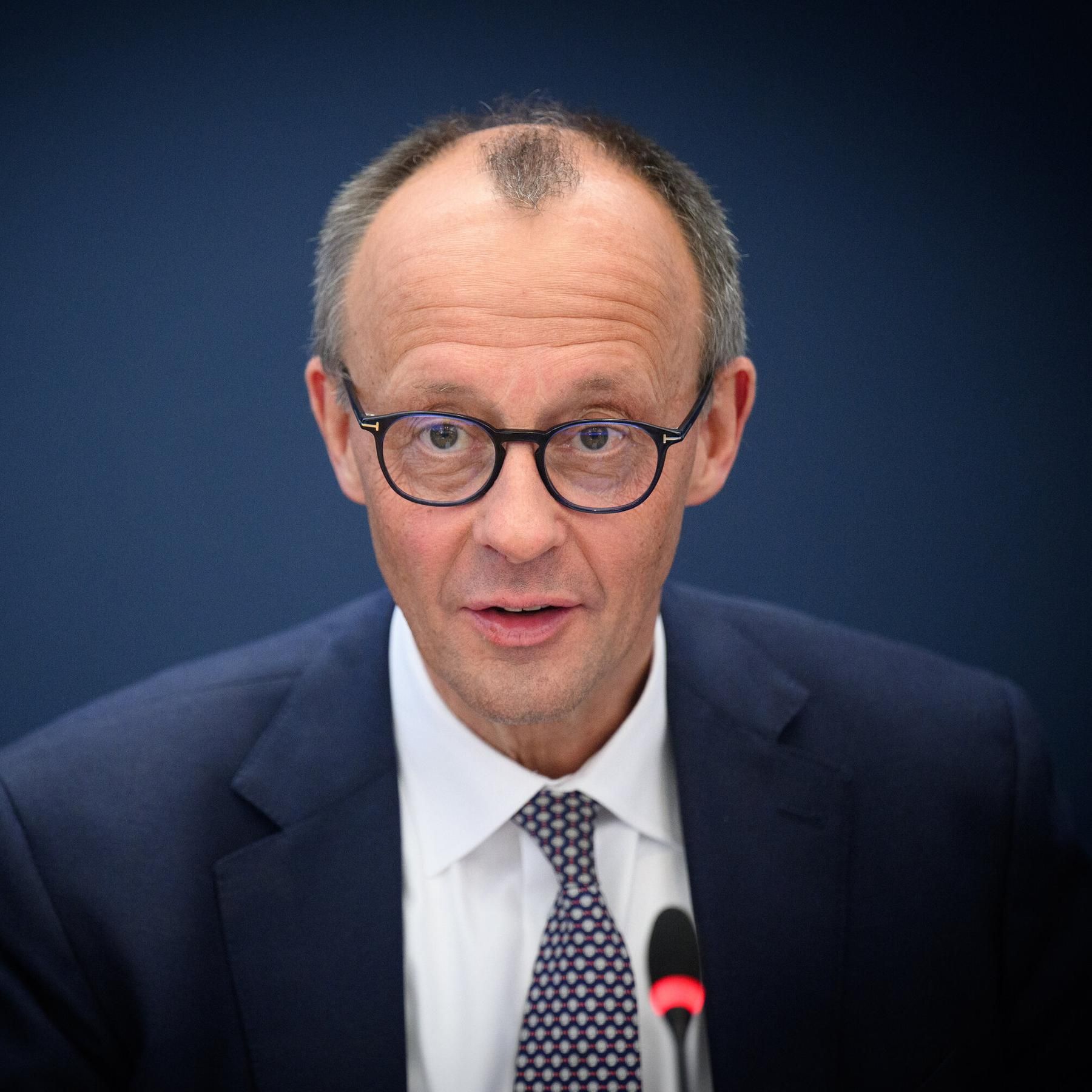 Merz zu Mindestlohn und Steuersenkungen